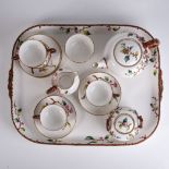 A BODLEY 'BLOSSOM' PATTERN TEA SERVICE, CIRCA 1876 Comprising: a teapot, a sugar bowl and cover, a