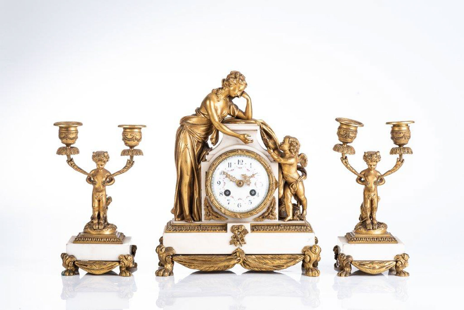 A 19TH CENTURY FRENCH ORMOLU AND GILT METAL CLOCK GARNITURE BUYERS ARE ADVISED THAT A SERVICE IS