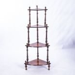 A VICTORIAN MAHOGANY AND INLAID CORNER WHATNOT Each curved open shelf on ring-turned tapering