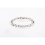 A DIAMOND TENNIS BRACELET Claw-set with round brilliant-cut diamonds weighing 7,50cts in total, in