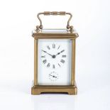 A BRASS CARRIAGE CLOCK BUYERS ARE ADVISED THAT A SERVICE IS RECOMMENDED FOR ALL CLOCKS