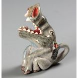 A SMALL ARDMORE JUG IN THE FORM OF A WARTHOG, 2010