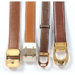 A GROUP OF FOUR VINTAGE GUCCI BELTS, 1960s - 1980s