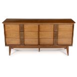 AN AMERICAN WALNUT MAYAN SIDEBOARD MANUFACTURED BY BASSETT FURNITURE INDUSTRIES, VIRGINIA, 1960S