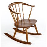 A COWHORN ROCKING CHAIR, MANUFACTURED BY ERCOL