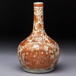 A CHINESE ROUGE-DE-FER 'PRECIOUS OBJECTS' BOTTLE VASE, QING DYNASTY, 19TH CENTURY