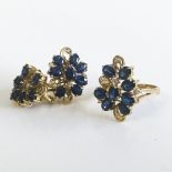 A SAPPHIRE AND DIAMOND RING AND MATCHING EAR CLIPS