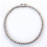 A DIAMOND TENNIS BRACELET