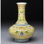 A CHINESE FAMILLE JAUNE 'BAT AND MUSICAL STONE' VASE, LATE REPUBLIC PERIOD, 1912 - 1949