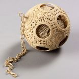 A MASSIVE CHINESE CANTON CARVED IVORY 'PUZZLE BALL', QING DYNASTY, 19TH CENTURY