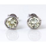 A PAIR OF DIAMOND EAR STUDS