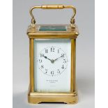 A FRENCH STRIKING BRASS CARRIAGE CLOCK, RETAILED BY WILLIAM LUND AND SONS, CORNHILL