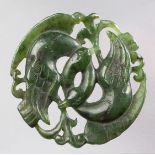 A CHINESE GREEN HARDSTONE 'CRANES' AMULET, POSSIBLY SPINACH JADE, QING DYNASTY, 19TH CENTURY