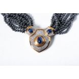 A SAPPHIRE, DIAMOND AND HEMATITE PENDANT NECKLACE