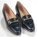 A PAIR OF VINTAGE CELINE TASSELED LEATHER LOAFERS