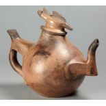 MOLELEKOA SIMON MASILO (SOUTH AFRICAN 1936 – 2018): A LARGE TERRACOTTA SCULPTURAL TEAPOT