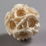A CHINESE IVORY PUZZLE BALL, PEOPLE'S REPUBLIC OF CHINA, 1949 -