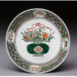 A CHINESE FAMILLE VERTE 'FLOWER BASKET' SAUCER-SHAPED DISH, QING DYNASTY, QIANLONG, 1735 - 1799