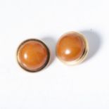 A PAIR OF AMBER EAR CLIPS