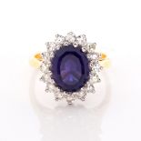 AN AMETHYST AND DIAMOND RING