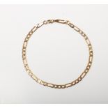 A 9CT GOLD FIGARO BRACELET