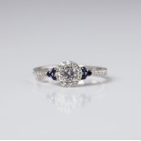 SILVER DIAMOND AND BLUE AND WHITE CREATED SAPPHIRE HALO RING