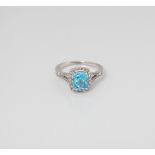 9CT WHITE GOLD BLUE TOPAZ AND DIAMOND KINGSLEY RING