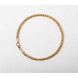 A 9CT GOLD WHEAT LINK BRACELET