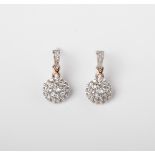 A PAIR OF 9CT GOLD AND SILVER MULTISTONE DIAMOND ROUND DROP STUD EARRINGS WITH GOLD CROSS DETAIL