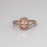 9CT ROSE GOLD OVAL MORGANITE AND DIAMOND HALO RING