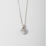 A 9CT GOLD AND SILVER ROUND CLUSTER PENDANT ON CHAIN WITH GOLD WISHBONE ACCENT