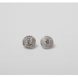 A PAIR SILVER DIAMOND STUD EARRINGS