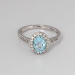 9CT WHITE GOLD BLUE TOPAZ, CREATED BLUE SAPPHIRE AND DIAMOND HALO RING