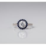 SILVER DIAMOND AND CREATED BLUE AND WHITE SAPPHIRE HALO RING