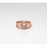 9CT ROSE GOLD OVAL MORGANITE AND DIAMOND HALO TWINSET