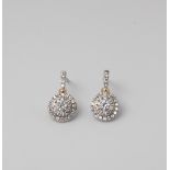 A PAIR OF 9CT GOLD AND SILVER MULTISTONE DIAMOND ROUND DROP STUD EARRINGS WITH GOLD CROSS DETAIL