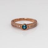 9CT ROSE GOLD BLUE TOPAZ AND WHITE SAPPHIRE SRESS RING WITH DIAMOND ACCENTS