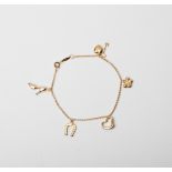 A 9CT GOLD & SILVER BONDED CHARM BRACELET