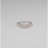 9CT WHITE GOLD MULTISTONE DIAMOND PAVE SOLITAIRE RING