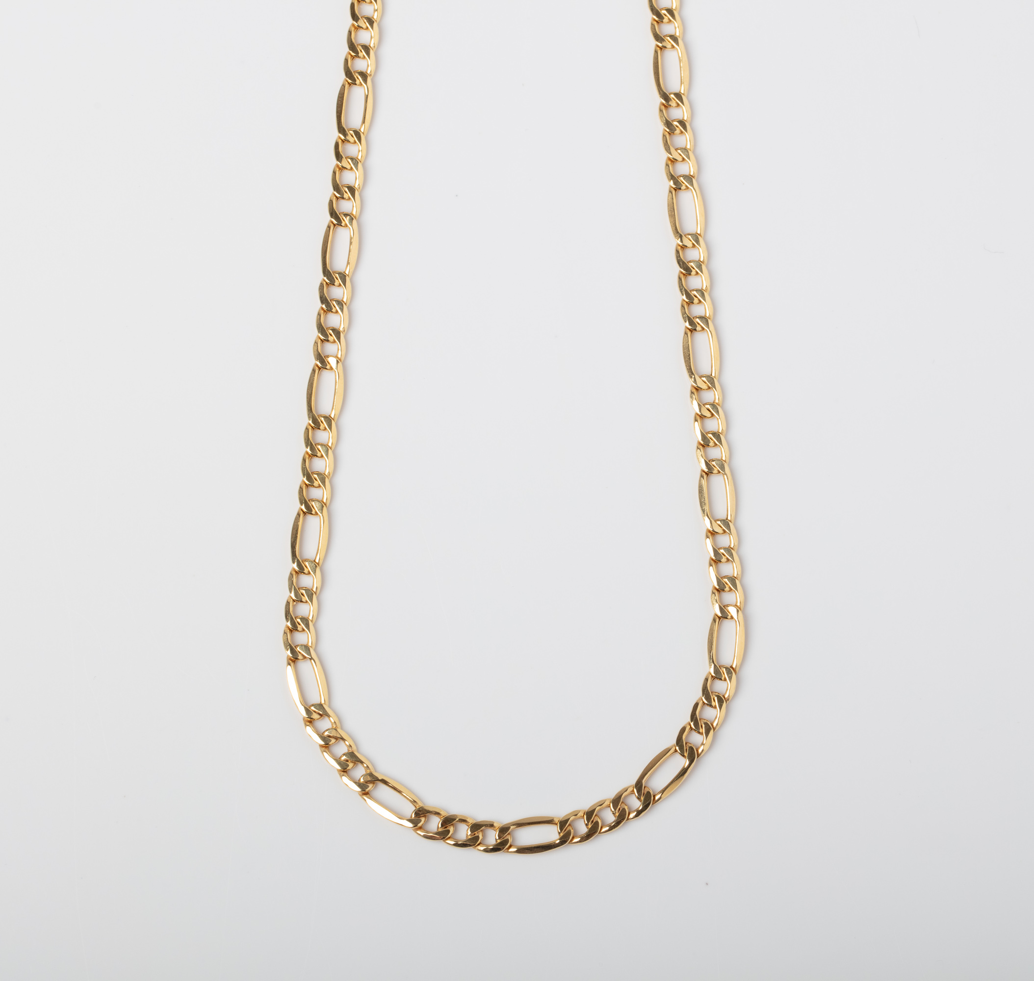 A 9CT GOLD FIGARO CHAIN