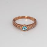 9CT ROSE GOLD BLUE TOPAZ AND WHITE SAPPHIRE SRESS RING WITH DIAMOND ACCENTS