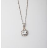 A 9CT GOLD AND SILVER CUSHION CLUSTER PENDANT ON CHAIN