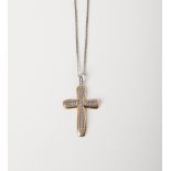 A 9CT GOLD AND SILVER DIAMOND CROSS PENDANT ON A CHAIN