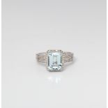 9CT WHITE GOLD AQUAMARINE AND DIAMOND EMERALD CUT SHAPED DRESS RING