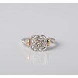 A 9CT GOLD AND SILVER MULTISTONE DIAMOND CUSHION SHAPED PROMISE RING