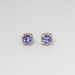 9CT WHITE GOLD CUSHION TANZANITE AND DIAMOND HALO STUD EARRINGS