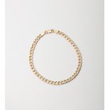 A 9CT GOLD & SILVER BONDED CURB BRACELET