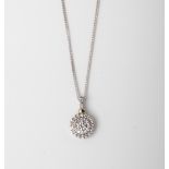 A 9CT GOLD AND SILVER ROUND CLUSTER PENDANT ON CHAIN WITH A GOLD ACCENT