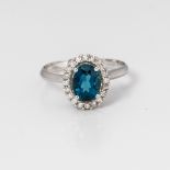 9CT WHITE GOLD BLUE TOPAZ AND DIAMOND CLUSTER RING