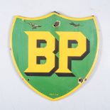 AN EMBOSSED BP PETROL SIGN